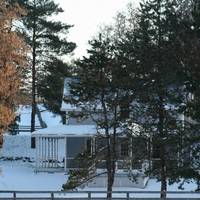 The farm house and paddocks